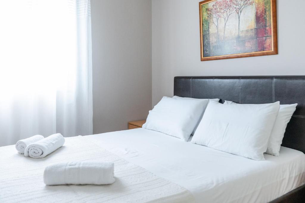 Łóżko lub łóżka w pokoju w obiekcie Romeo apartment