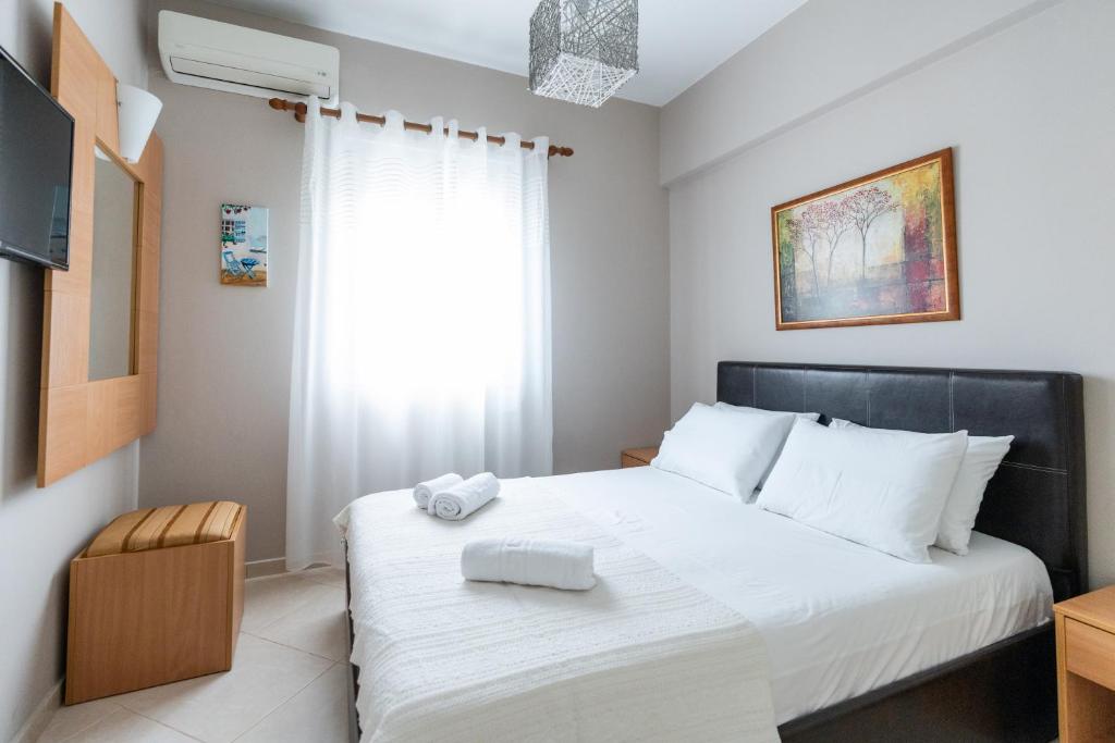 Łóżko lub łóżka w pokoju w obiekcie Romeo apartment