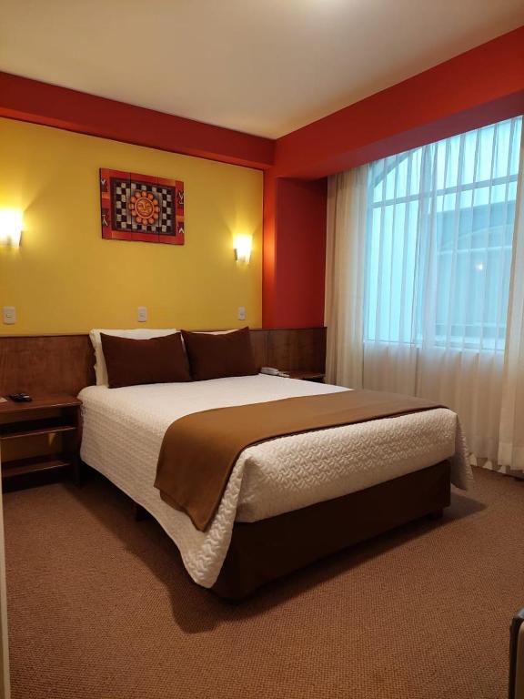 Postel nebo postele na pokoji v ubytování Hotel Munay Tambo
