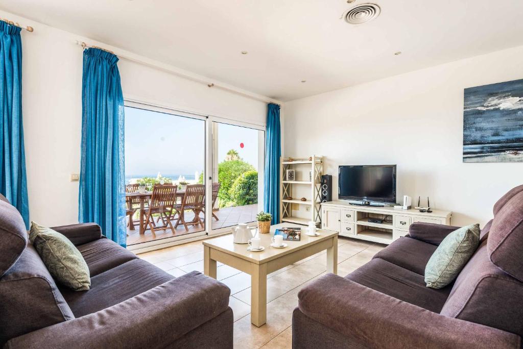 A television and/or entertainment centre at Villa Satalaia