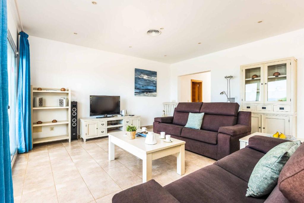A television and/or entertainment centre at Villa Satalaia