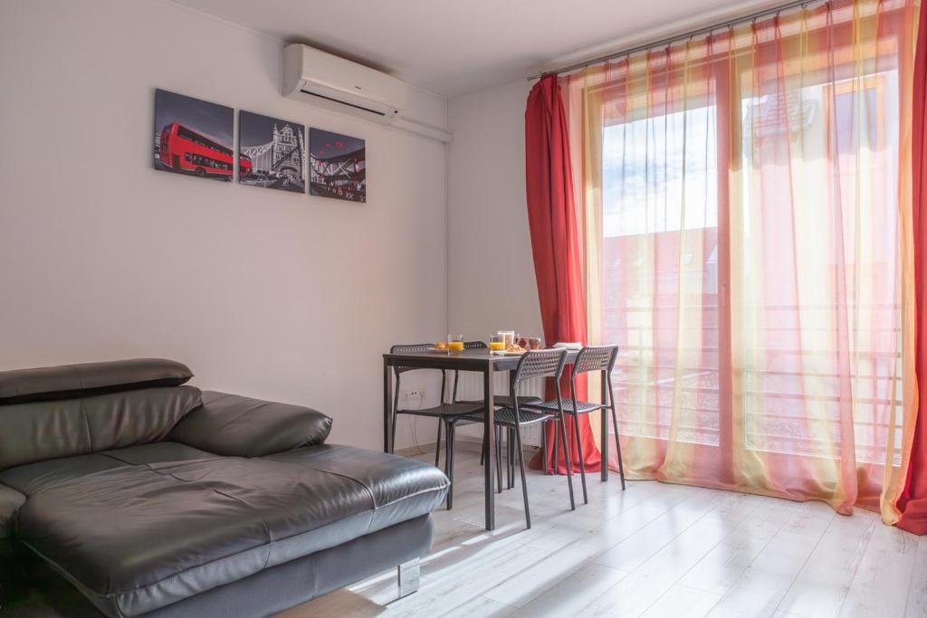 Posedenie v ubytovaní Apartment City Inn Pécs