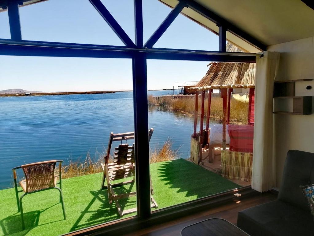 a view of the water from a screened in porch at Uros Aruma-Uro on Uros Floating Islands in Puno