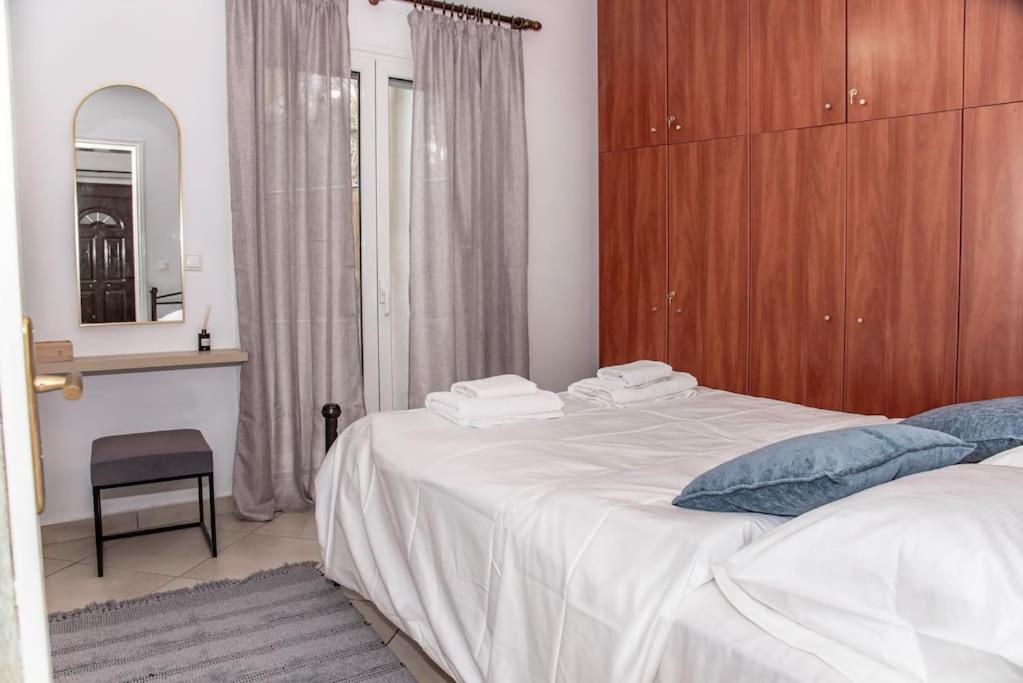 Postel nebo postele na pokoji v ubytování Sotiris Apartment