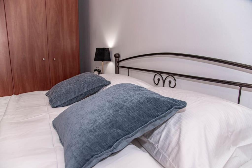 Postel nebo postele na pokoji v ubytování Sotiris Apartment