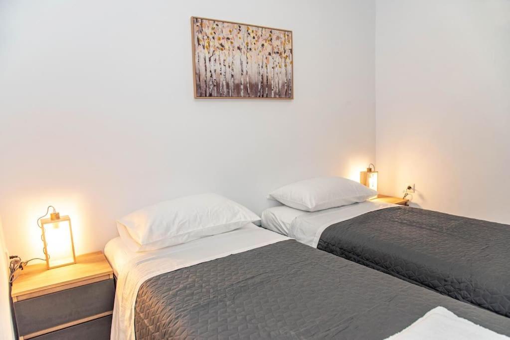 Postel nebo postele na pokoji v ubytování Sotiris Apartment