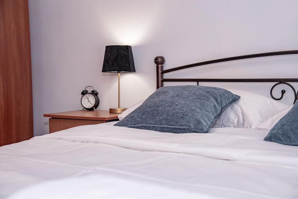 Postel nebo postele na pokoji v ubytování Sotiris Apartment
