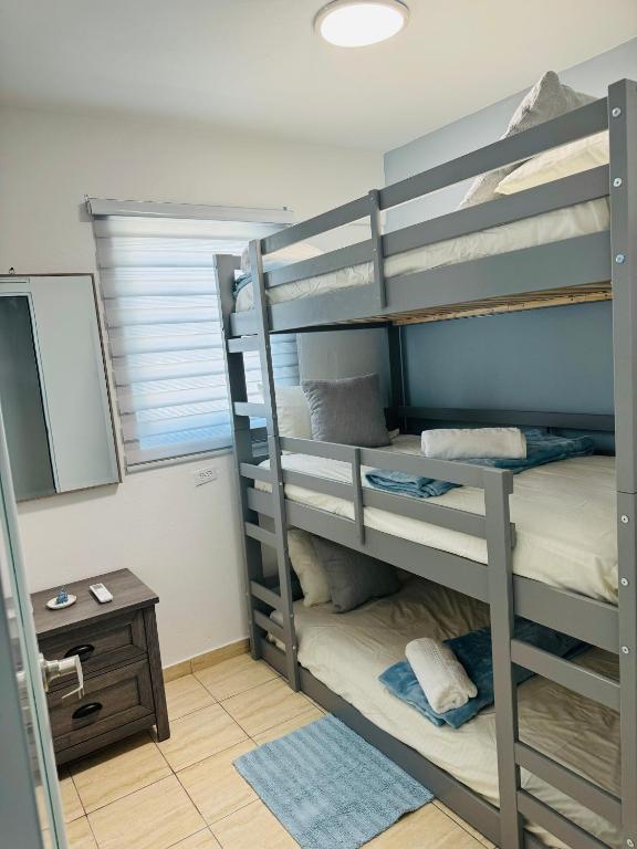 Postel nebo postele na pokoji v ubytování New! Mini Casa de Playa