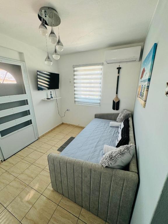 TV a/nebo společenská místnost v ubytování New! Mini Casa de Playa