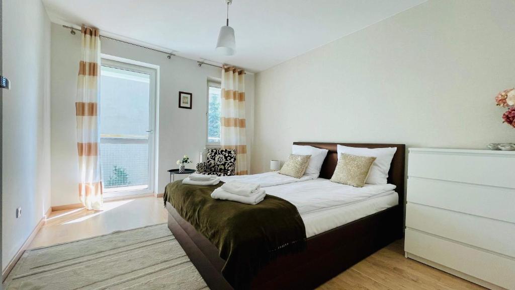 Posteľ alebo postele v izbe v ubytovaní Apartament Parkowy by RENT4YOU