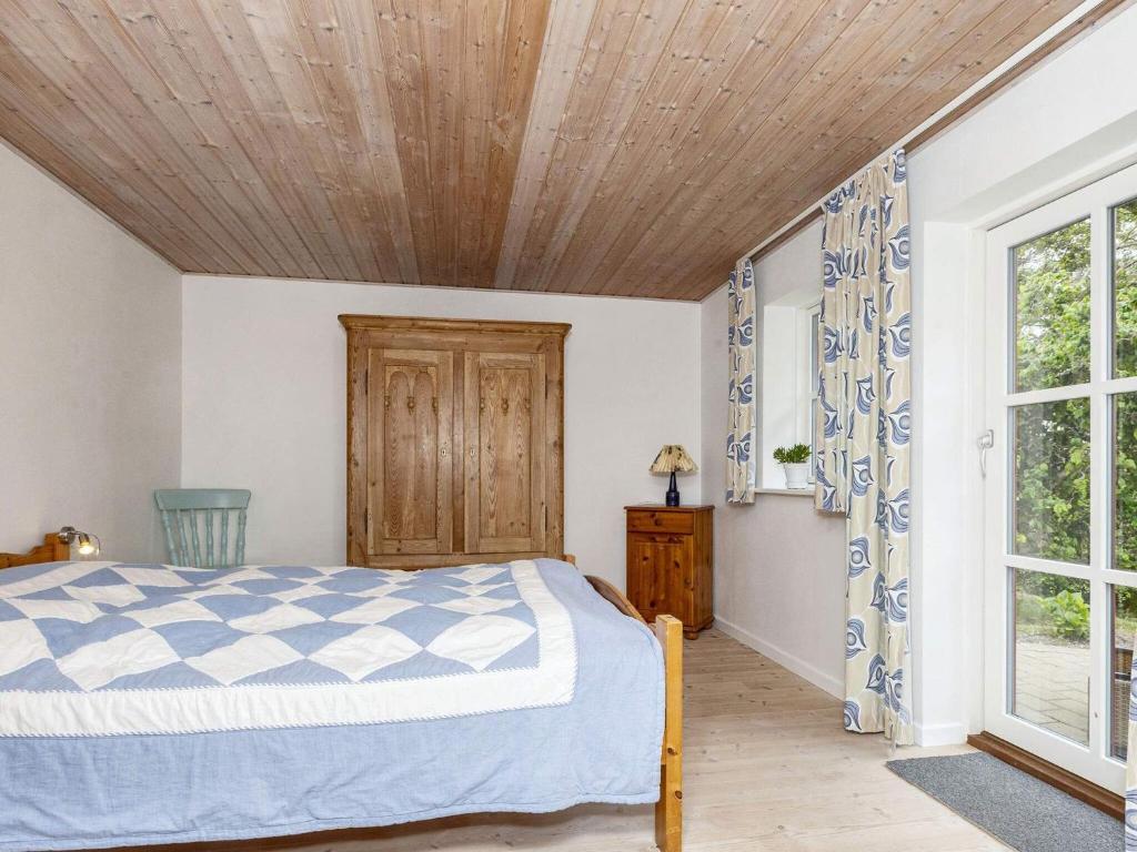 Postel nebo postele na pokoji v ubytování 6 person holiday home in Thisted-By Traum