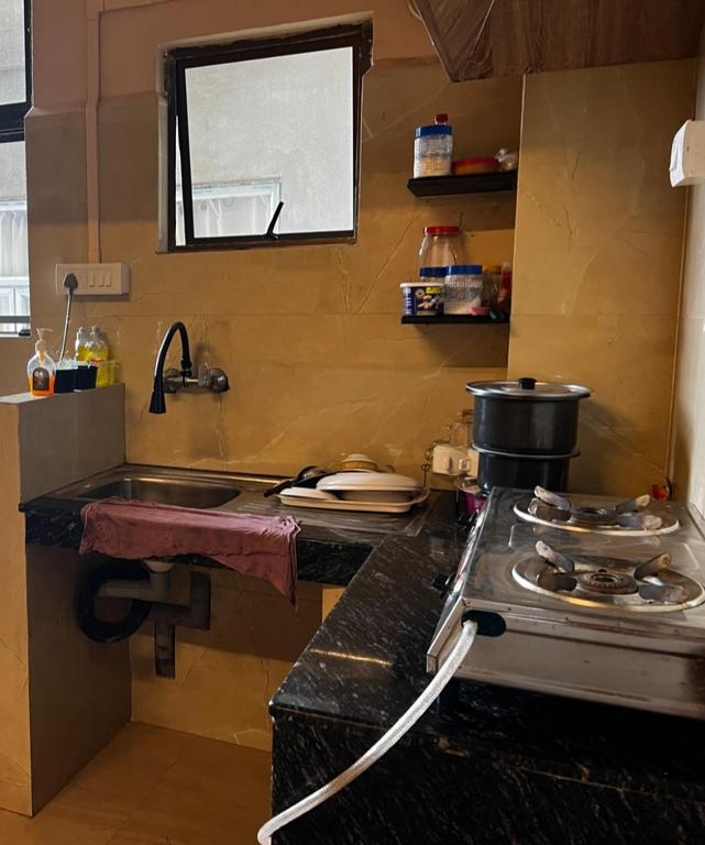 Kuchyň nebo kuchyňský kout v ubytování Zaras Cottage