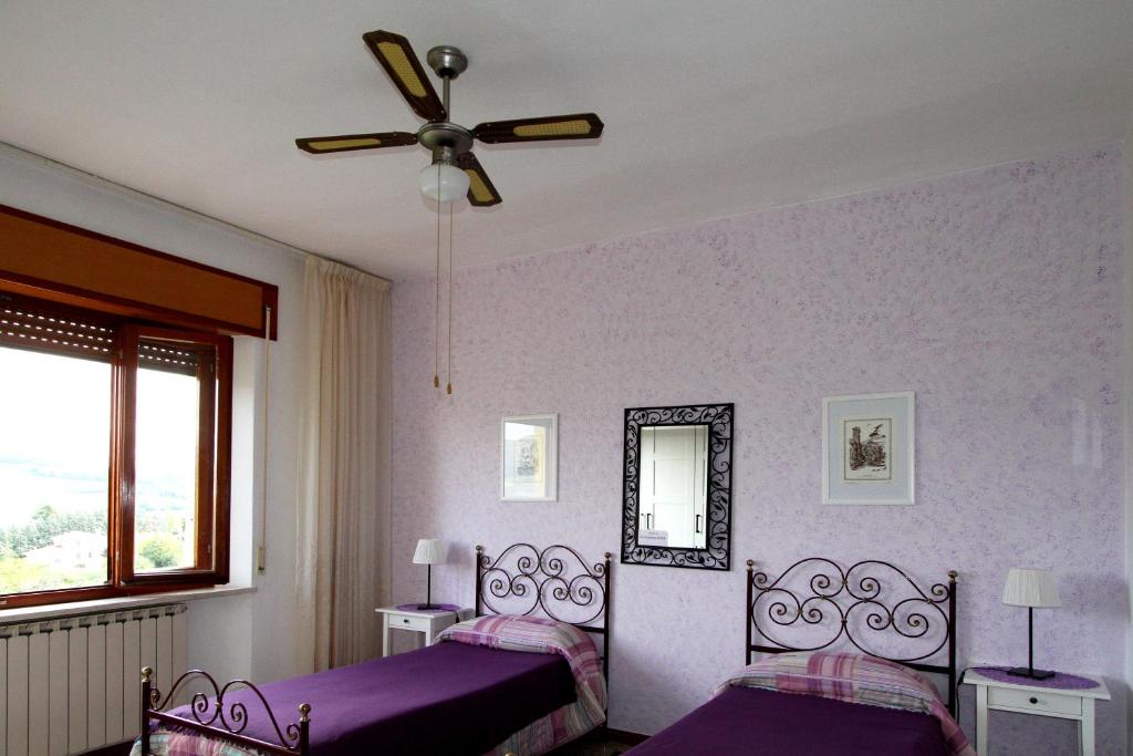Postel nebo postele na pokoji v ubytování B&B L'Armonia