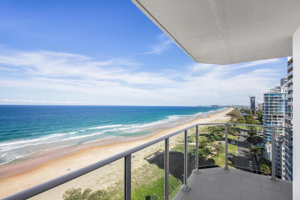 a view of the beach from the balcony of a condo at Boulevard Towers on Broadbeach in Gold Coast