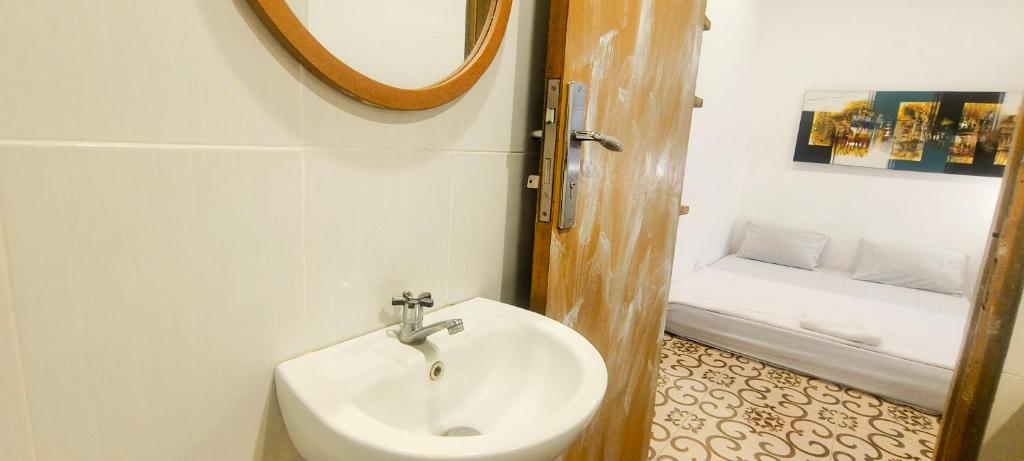 Postel nebo postele na pokoji v ubytování Damuh Guest House