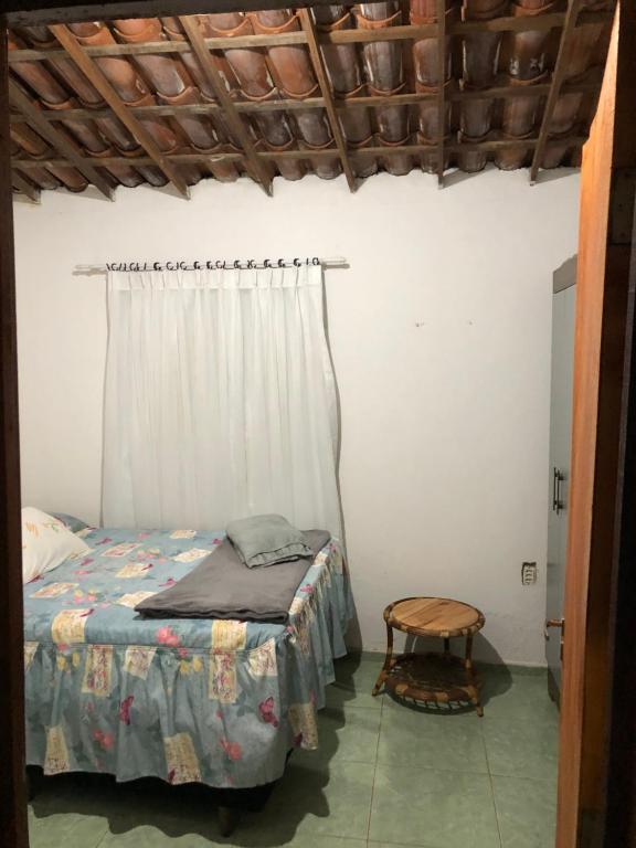 Postel nebo postele na pokoji v ubytování Casinha no Sítio