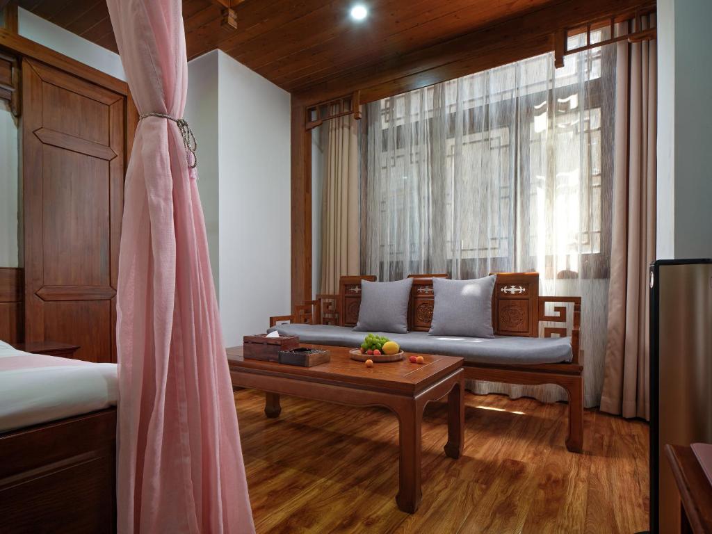 Postel nebo postele na pokoji v ubytování Lee's Boutique Resort