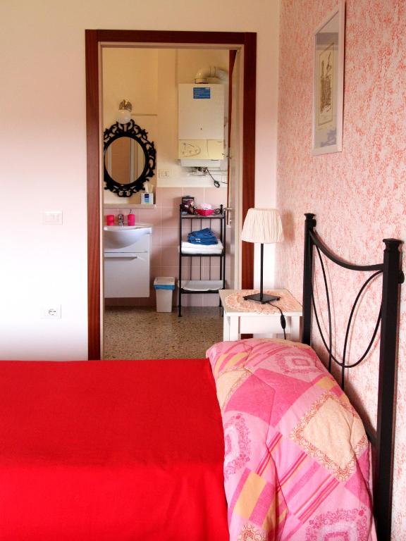 Postel nebo postele na pokoji v ubytování B&B L'Armonia