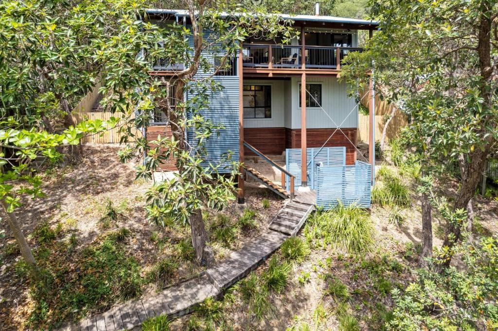 Κήπος έξω από το Baumhaus by Discover Stradbroke