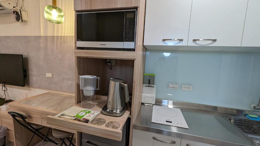 Kuchyň nebo kuchyňský kout v ubytování 182和光居--自助入住&加Line取得入住資訊