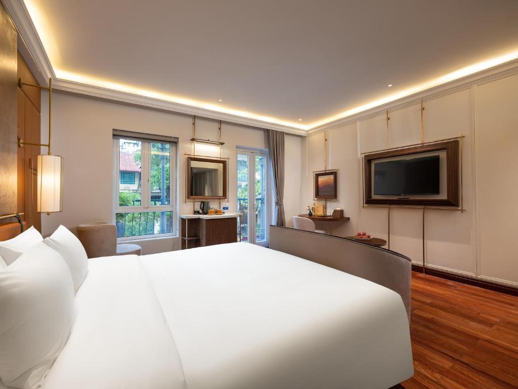 TV a/nebo společenská místnost v ubytování Minerva Premium Hotel