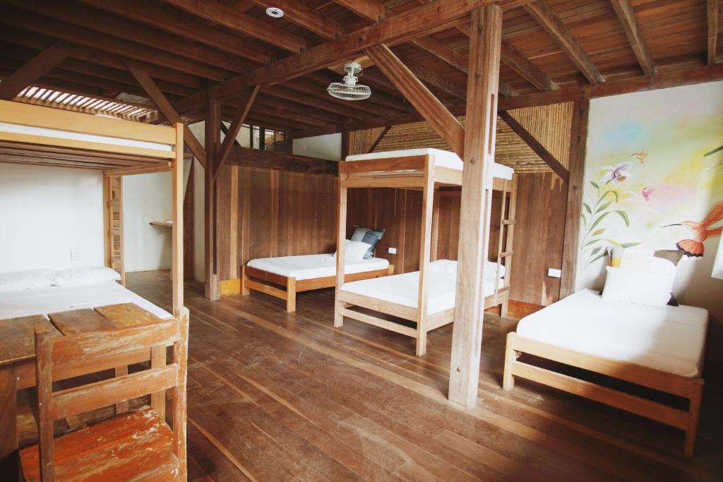 Postel nebo postele na pokoji v ubytování La Fauna Hotel