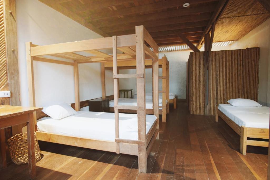 Postel nebo postele na pokoji v ubytování La Fauna Hotel