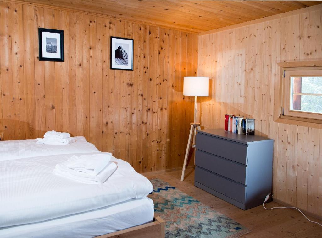 Postel nebo postele na pokoji v ubytování Tech-Free Haven - Acla Sissi - Lenzerheide