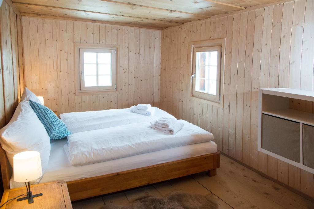 Postel nebo postele na pokoji v ubytování Tech-Free Haven - Acla Sissi - Lenzerheide