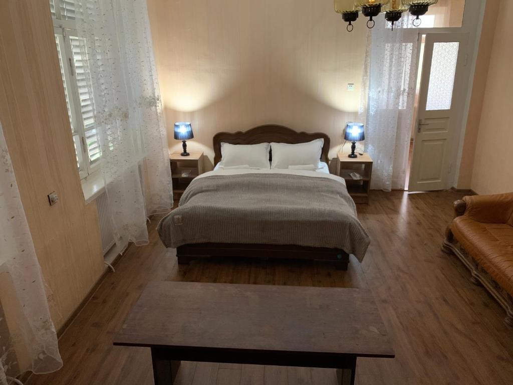 Postel nebo postele na pokoji v ubytování Villa Bodbe