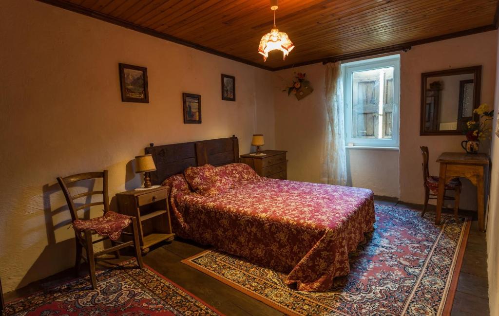 Postel nebo postele na pokoji v ubytování Gîte Enzo
