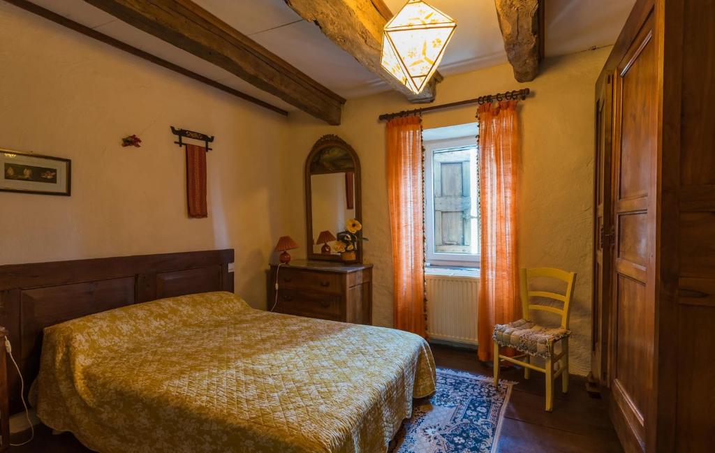 Postel nebo postele na pokoji v ubytování Gîte Enzo