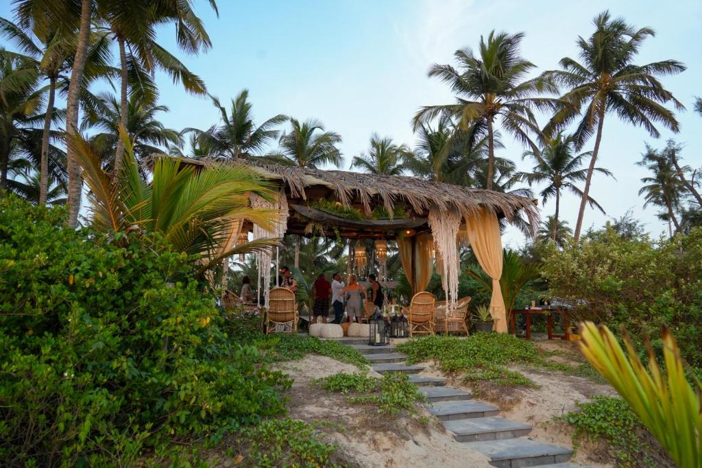 Zahrada ubytování Villa Fiesta - Beachfront Getaway