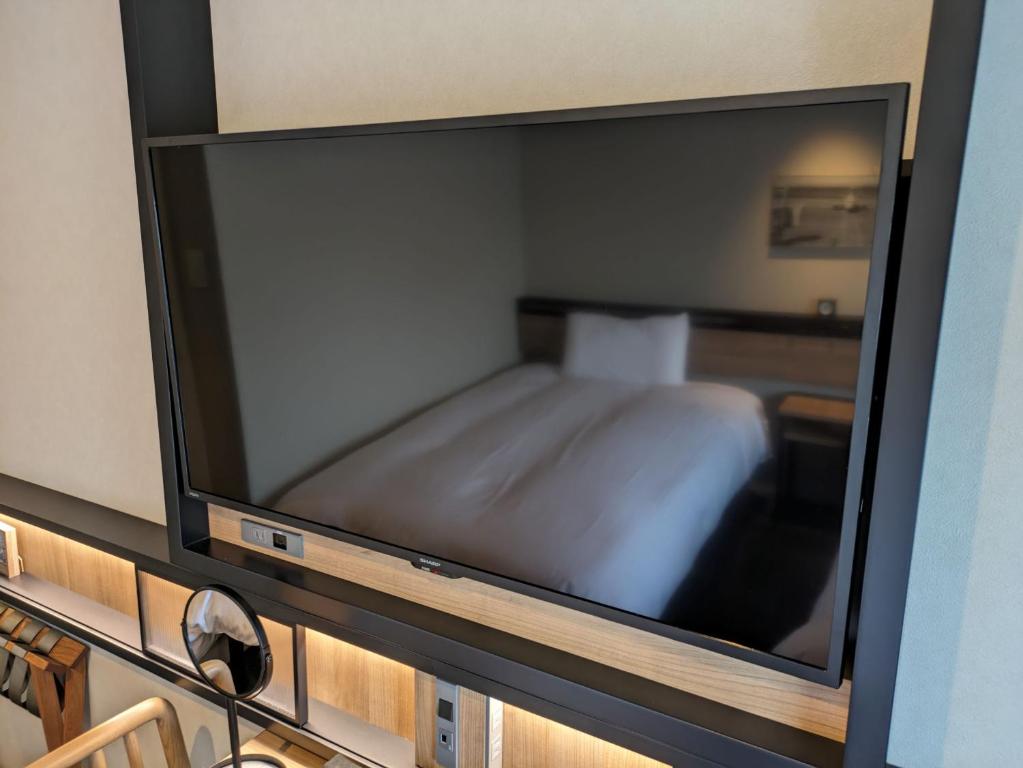 Postel nebo postele na pokoji v ubytování REF Kansai Airport by VESSEL HOTELS
