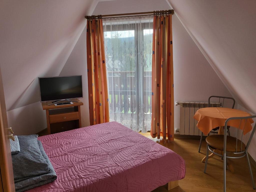 Posteľ alebo postele v izbe v ubytovaní Willa Anda