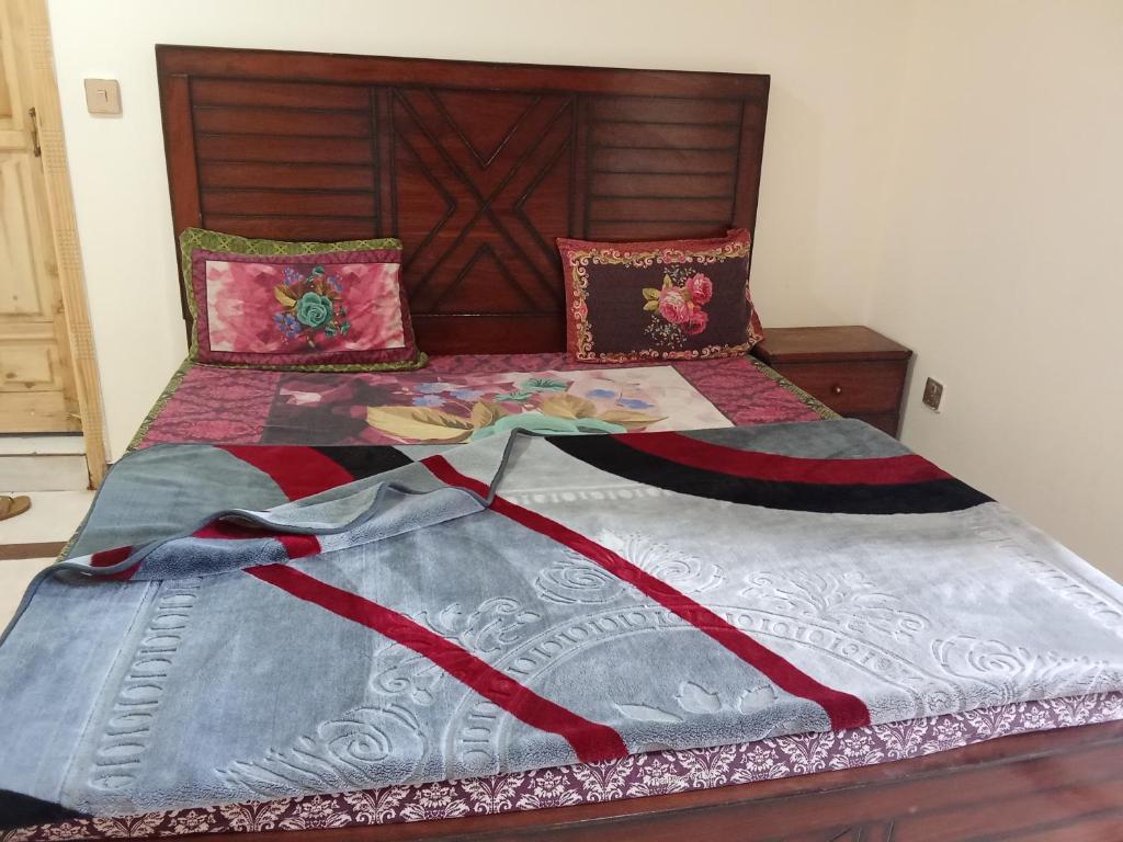 Postel nebo postele na pokoji v ubytování Crystal Hotel