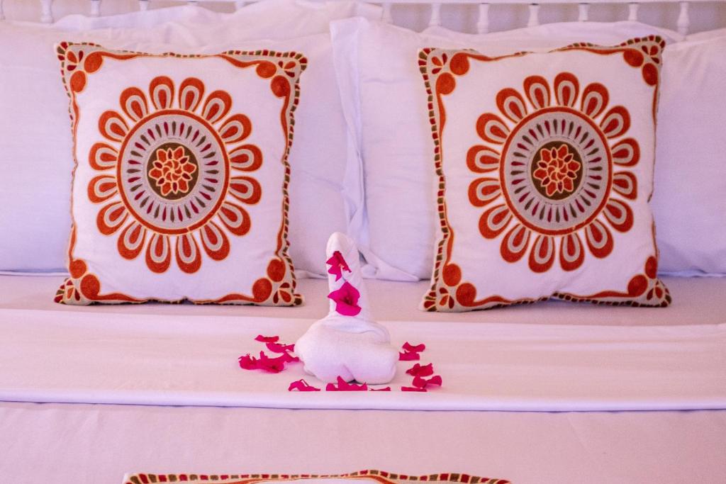 Letto o letti in una camera di Shela Bahari
