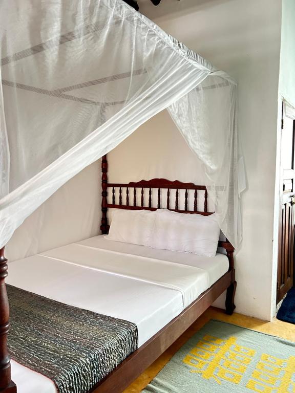 Letto o letti in una camera di Shela Bahari