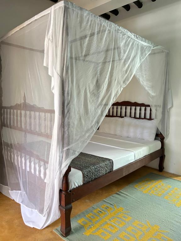 Letto o letti in una camera di Shela Bahari