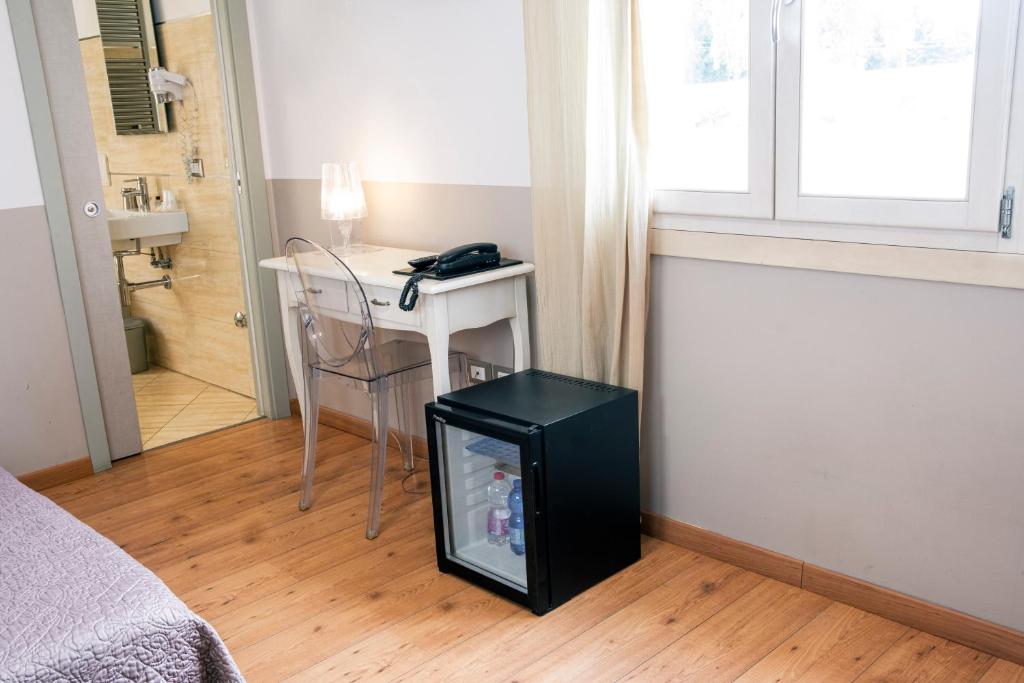 TV a/nebo společenská místnost v ubytování Hotel Volta