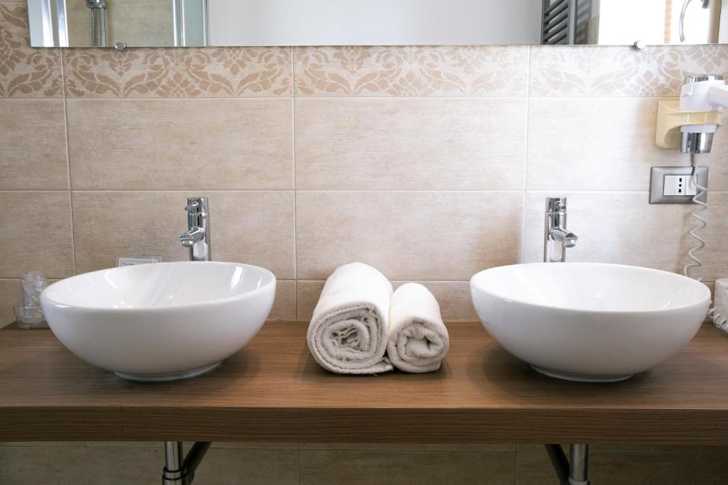 Koupelna v ubytování Hotel Volta