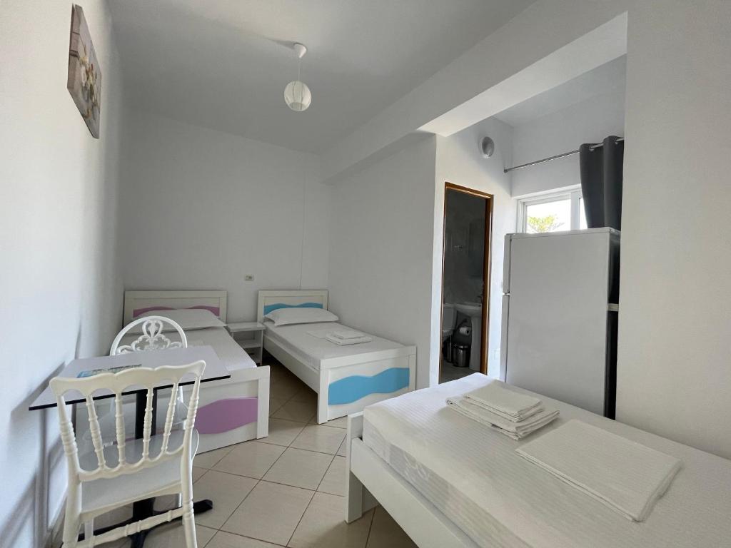 Posteľ alebo postele v izbe v ubytovaní Joni Apartments