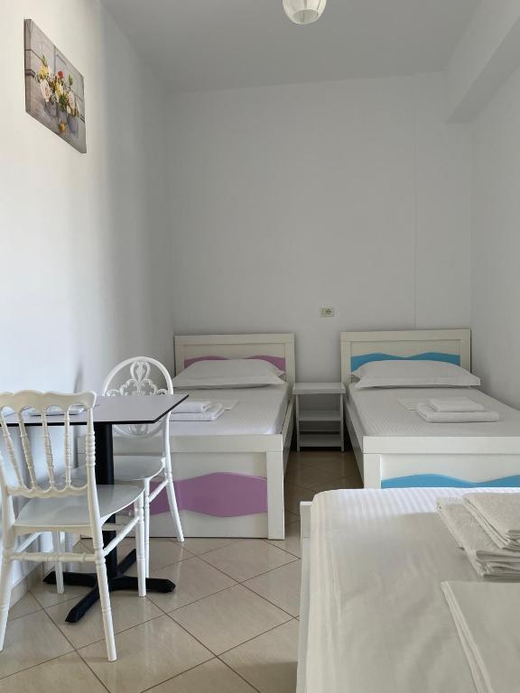 Posteľ alebo postele v izbe v ubytovaní Joni Apartments