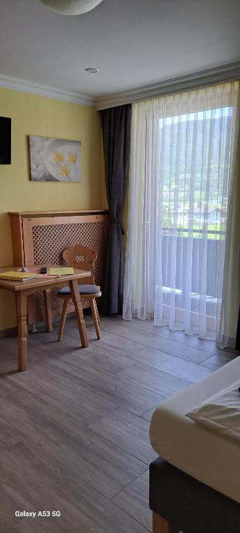 TV a/nebo společenská místnost v ubytování Gästehaus Steger