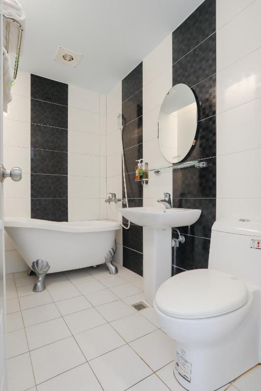 Koupelna v ubytování Xing Ji Hotel