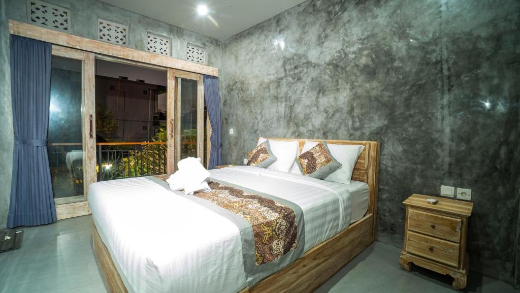 Postel nebo postele na pokoji v ubytování Skyline House Ubud View by EPS