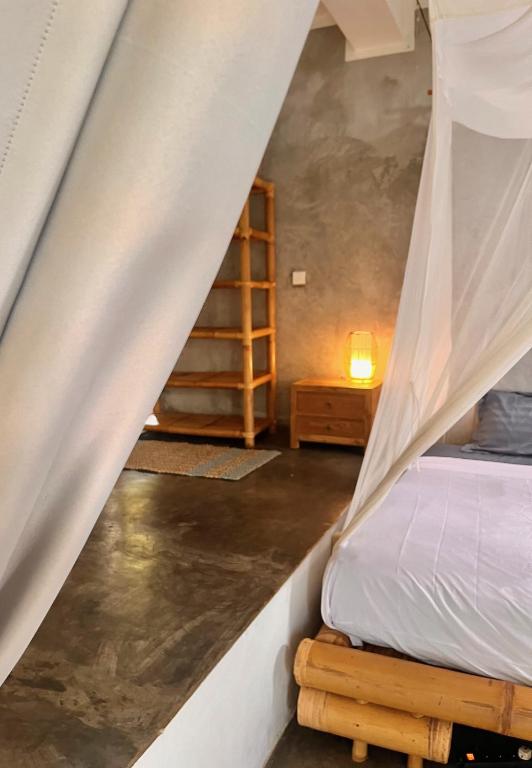 Letto o letti in una camera di Vertical House Bali
