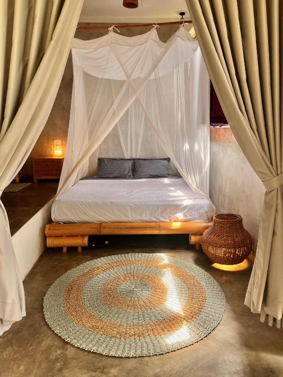 Letto o letti in una camera di Vertical House Bali