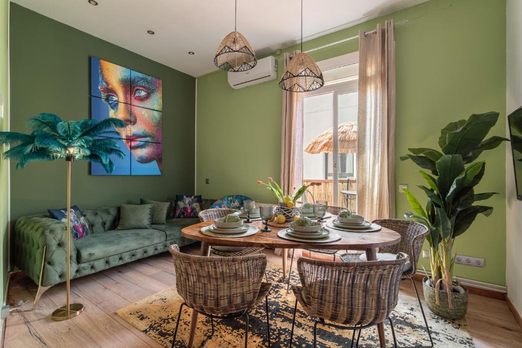 a living room with a table and a couch at OASIS BEACH-CITY apartment in Montgat