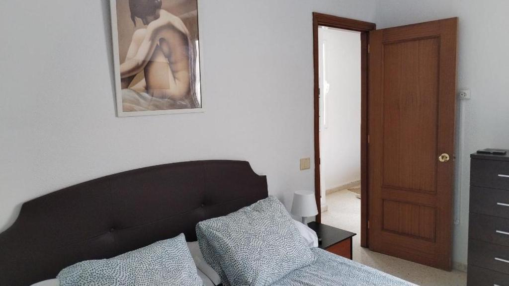 Postel nebo postele na pokoji v ubytování Apartamento Sol A free parking air conditioning